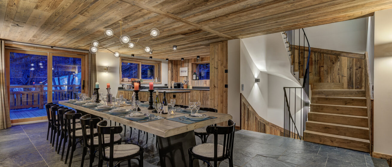 Chalet Bergeronnette, Meribel - open-plan kitchen /diner with table set for dinner